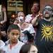 Ian Fulcher (right) participates in the Ann Arbor Zombie Walk with his kids on Saturday. Daniel Brenner I AnnArbor.com